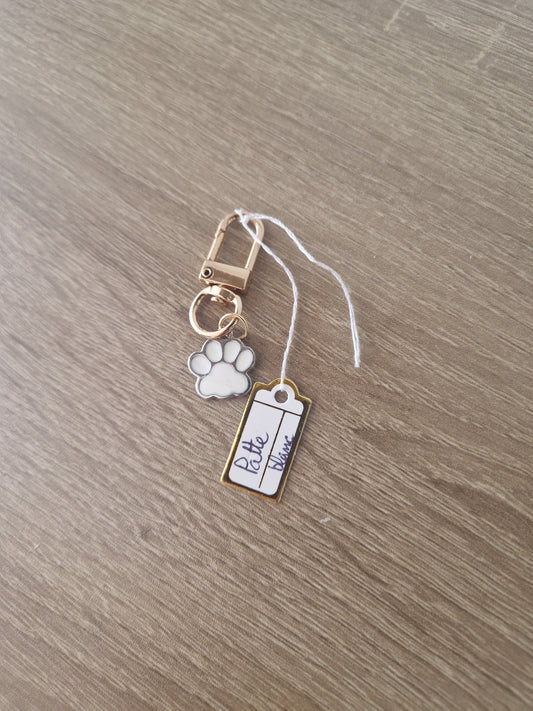 White paw keychain