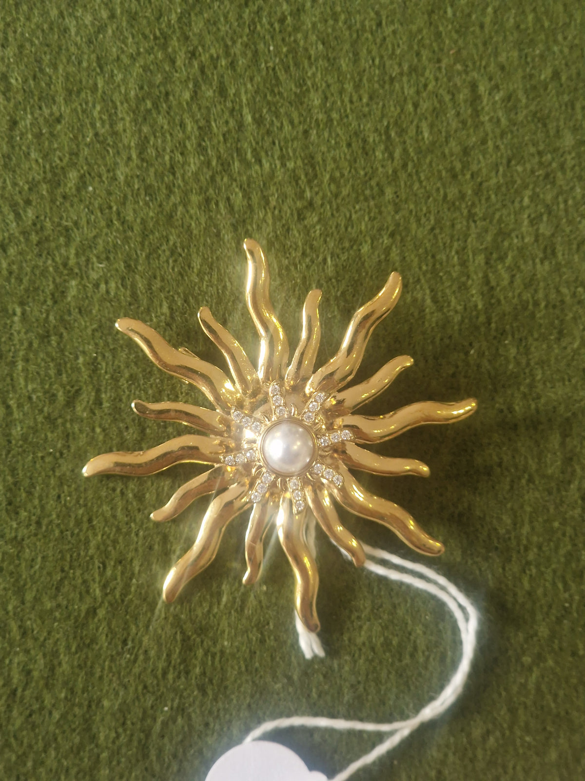 Broche soleil