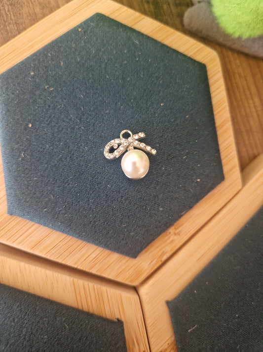 Silver rhinestone bow charm