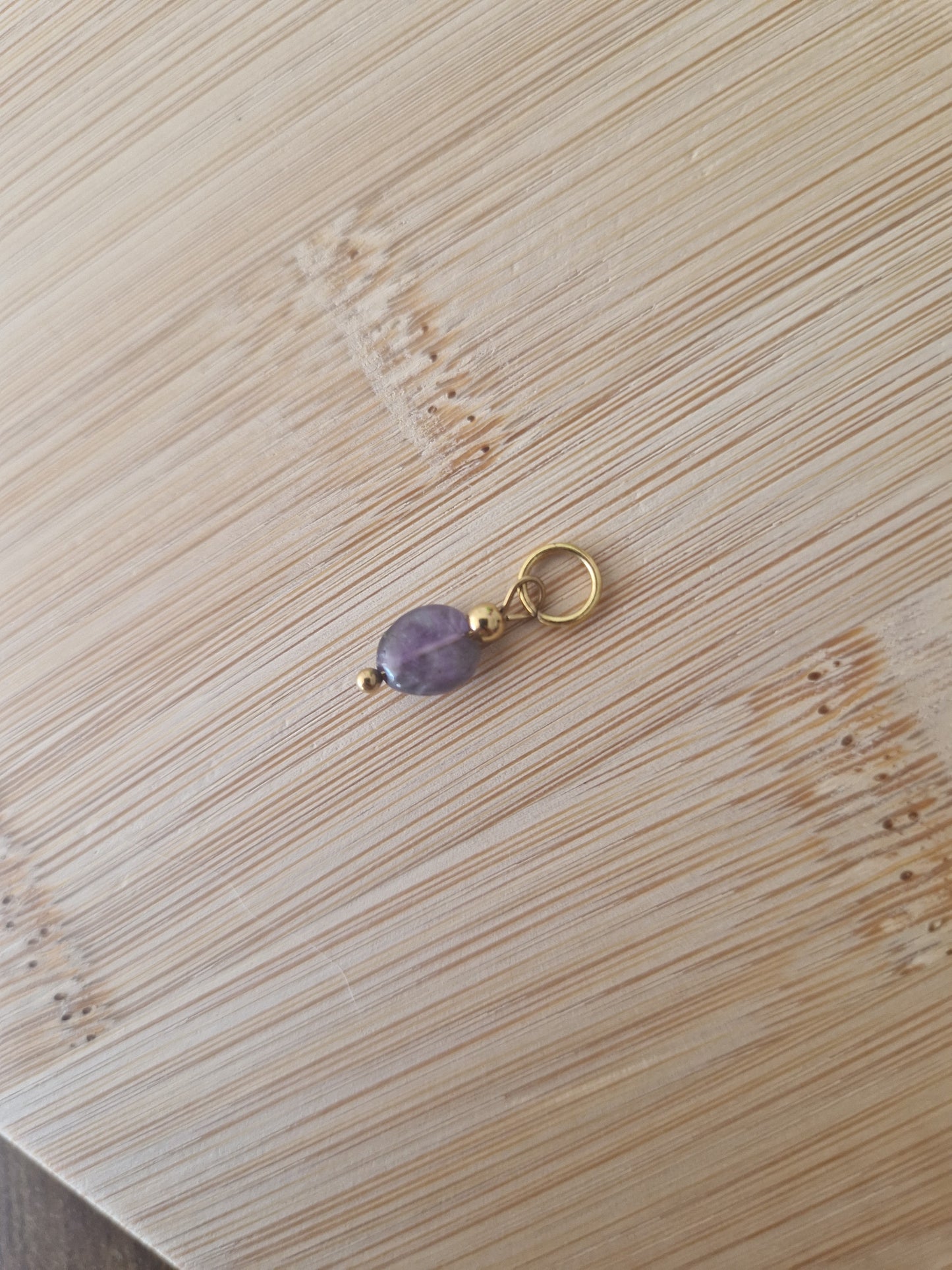Natural stone charm